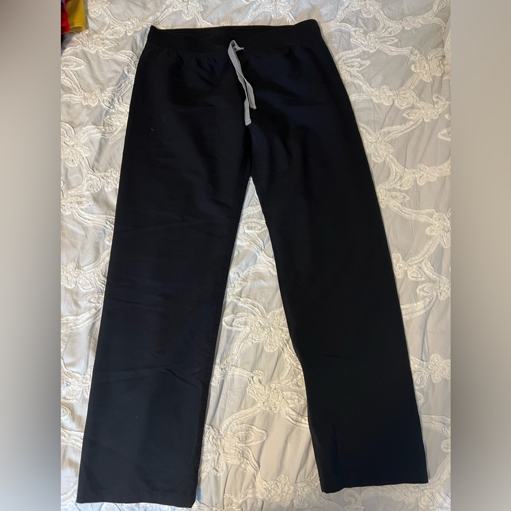 Women’s size M black scrub bottoms.